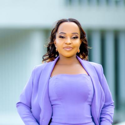 Professional headshot of Airini Erasmi Mbowe in formal attire