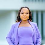 Professional headshot of Airini Erasmi Mbowe in formal attire
